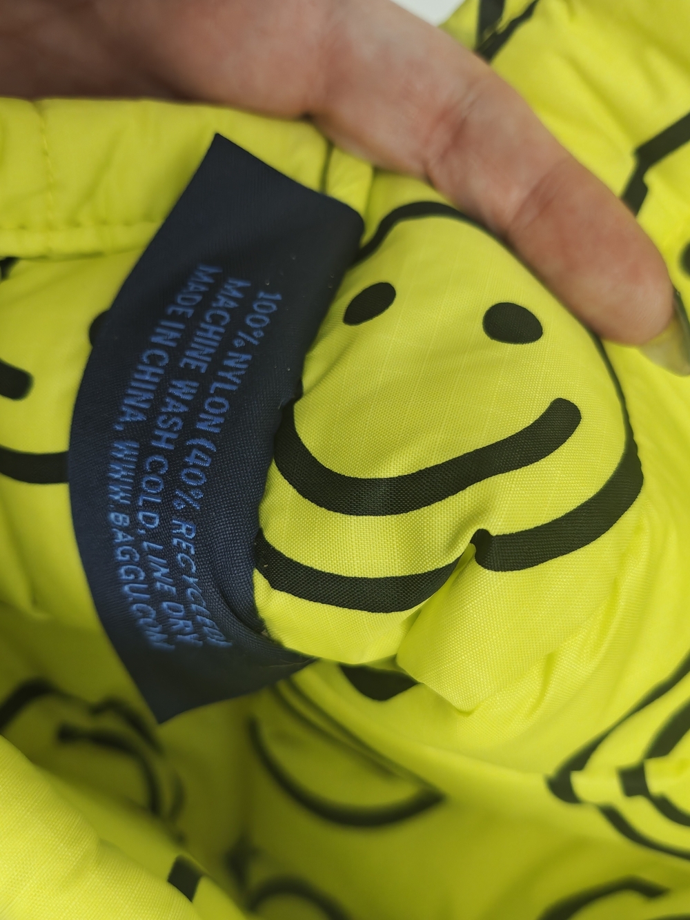 BAGGU Smiley Face laptop sleeve